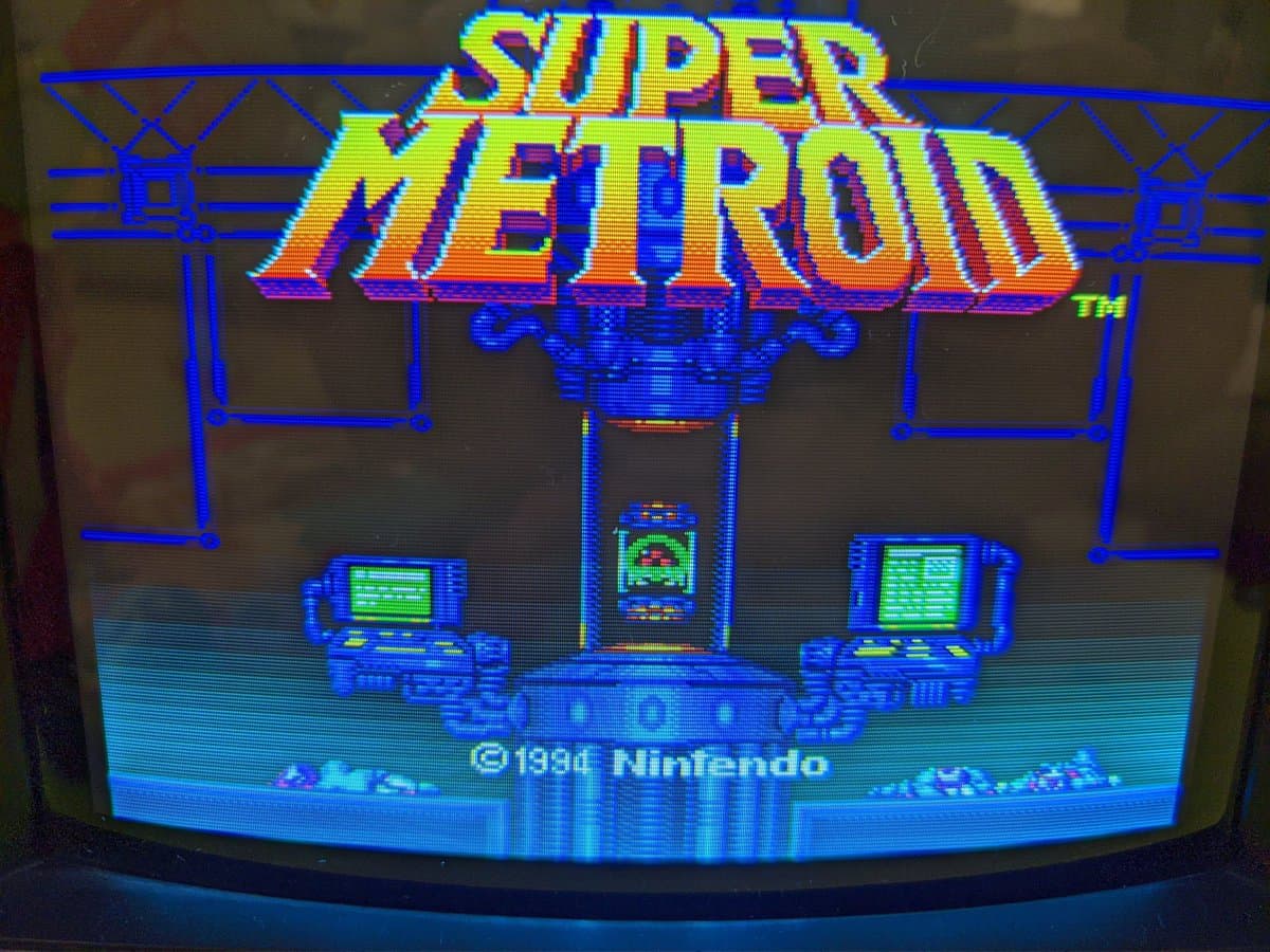 Super Metroid title screen displayed on restored Sony BVM-9045QD CRT, showing vibrant colors and sharp image quality post-restoration.