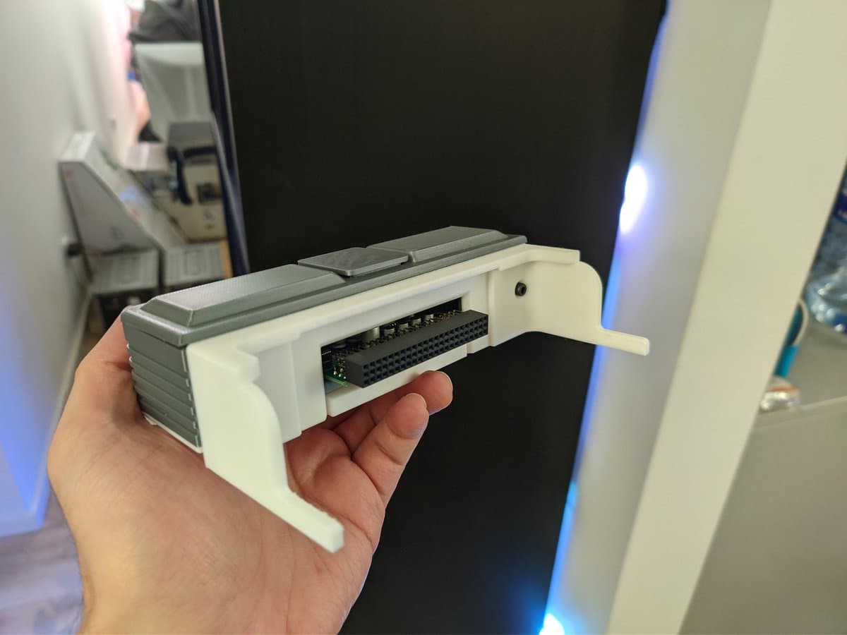 Refurbished NEC PC Engine SuperGrafx cartridge port connector with new capacitors installed in custom mini-IFU shell housing.