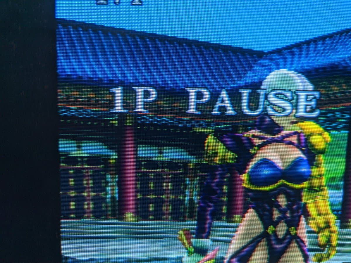 Sony CPD-G420 CRT displaying Soul Calibur arcade game via Dreamcast, showing repaired geometry and color after G2 voltage calibration fix.