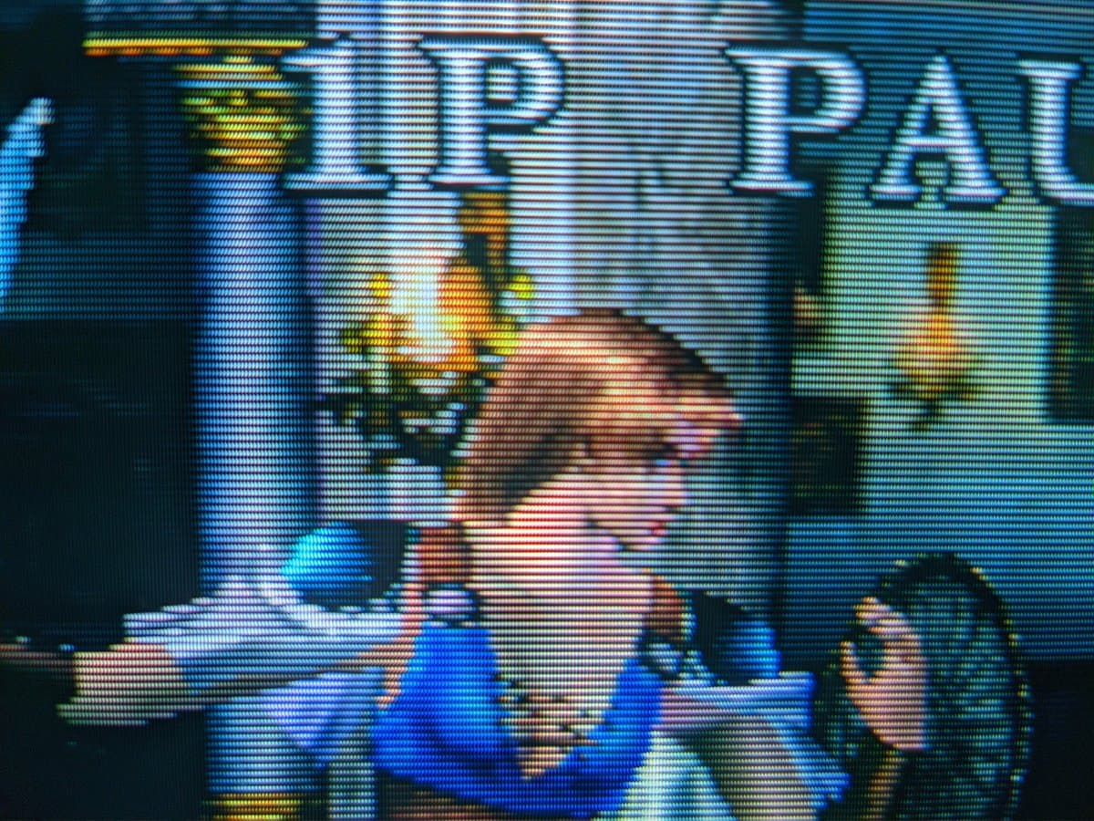 Philips 109S4 CRT displaying Soul Calibur gameplay; aperture grille pixel structure visible in close-up, showing color convergence and image clarity.