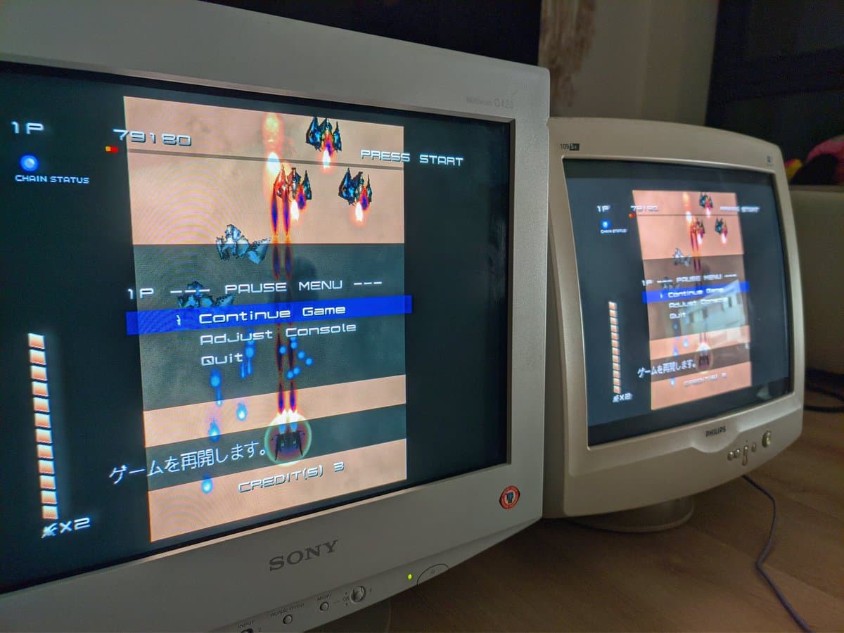 Sony CPD-G420 CRT displaying Ikaruga gameplay after G2 voltage calibration repair via WinDAS serial connection.