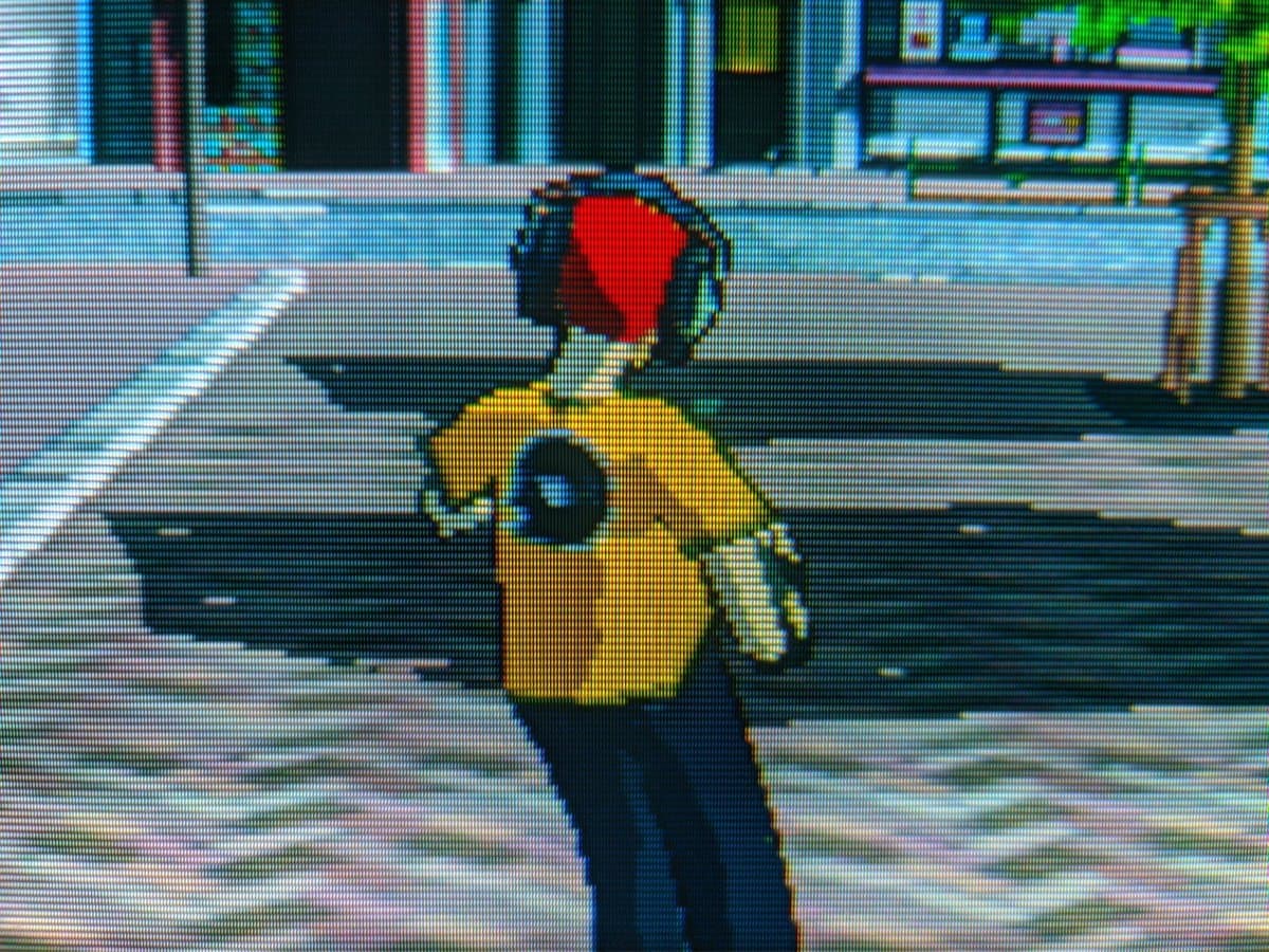 Sony CPD-G420 displaying Jet Set Radio gameplay after G2 voltage calibration repair; vibrant yellow character sprite visible on screen.