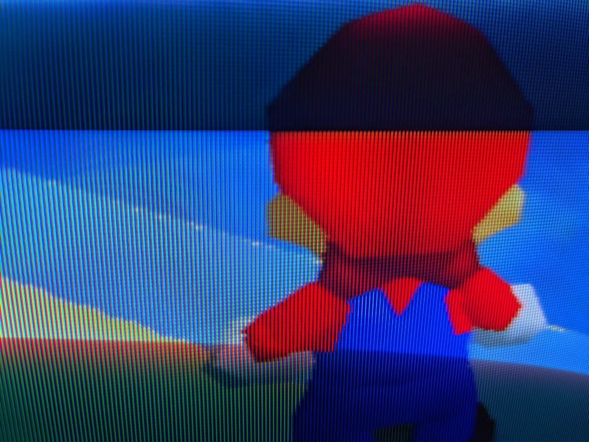 Mario character on Sony PVM-9040 CRT displaying via S-video from Nintendo 64, showing color accuracy after repair work.