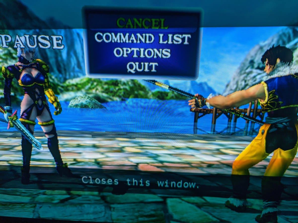 Soulcalibur pause menu displayed on Sony CPD-E430 CRT monitor, showing command list options during gameplay testing.