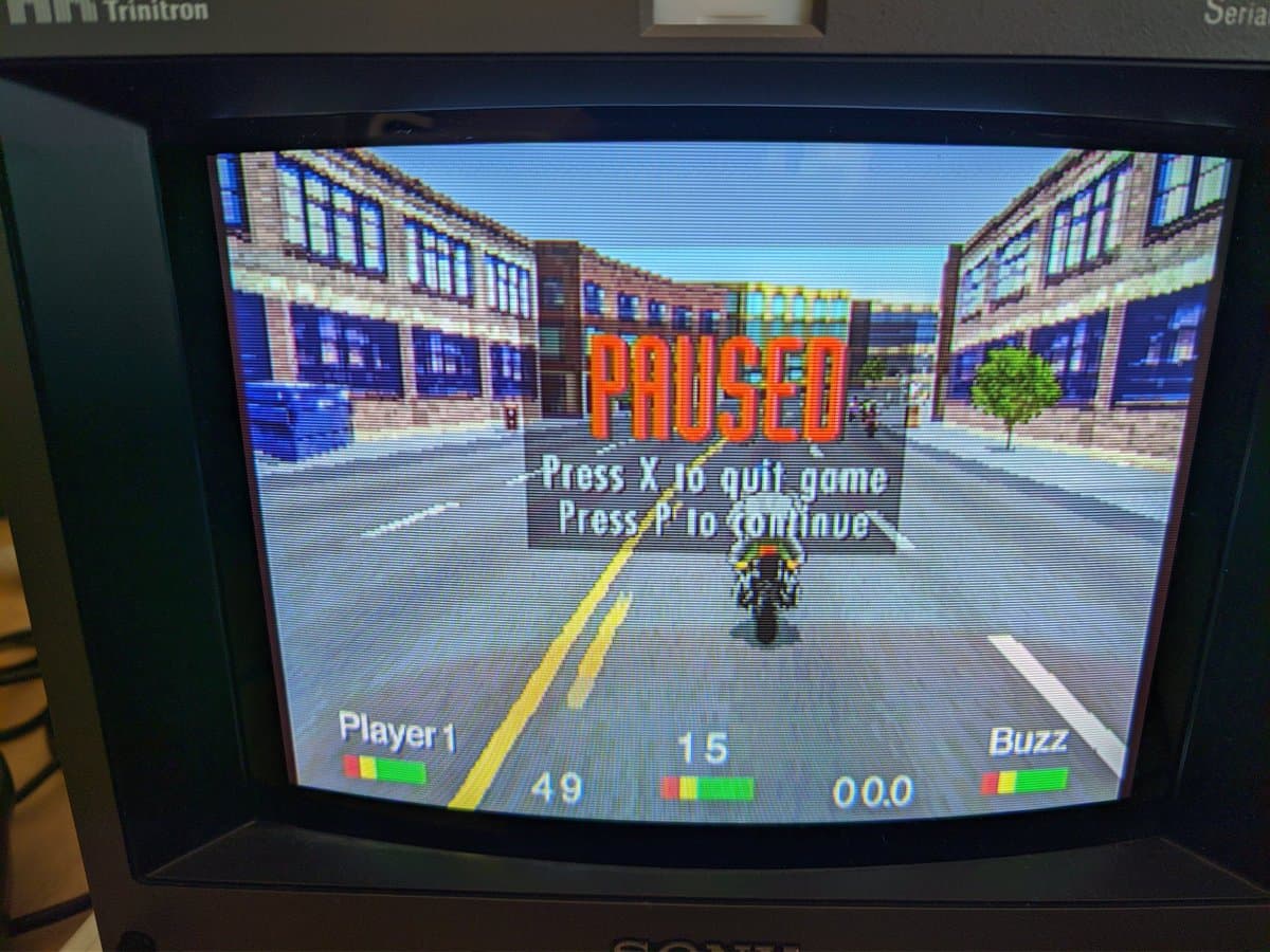 Road Rash running on restored Panasonic FZ-1 3DO; pause screen shows Player 1 score 49, Buzz 00.0, confirming laser and disc compatibility repair successful.
