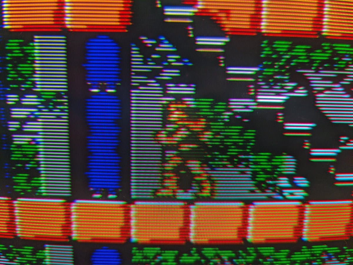 Composite video test on BVM-D14H1E showing Castlevania (Famicom) and Super Mario 64 (N64) with characteristic RGB phosphor scanlines and color artifacting.