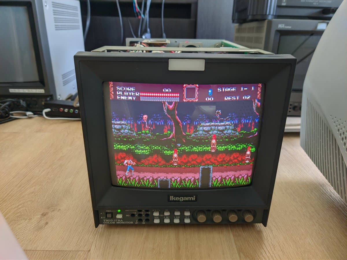 Ikegami TM10-17RA CRT monitor displaying Castlevania arcade game, showing Stage 1-1 gameplay with score and enemy indicators on screen.