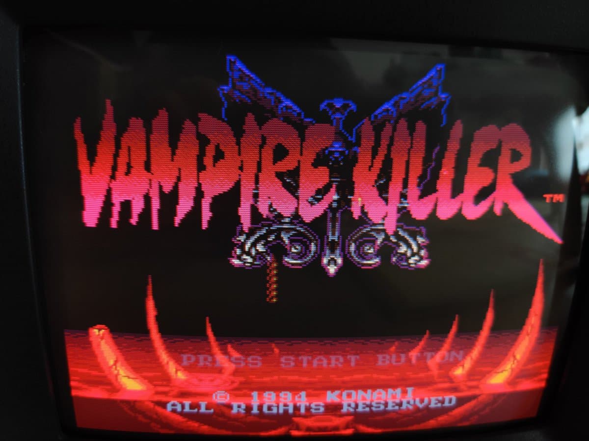 Ikegami TM10-17RA CRT displaying Whip Kick arcade game title screen with red and blue graphics on black background.