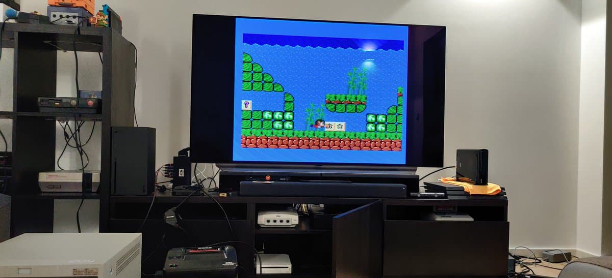 RGB-modified Sega Master System II displaying Alex Kidd in Miracle World on CRT monitor, post-repair validation test.