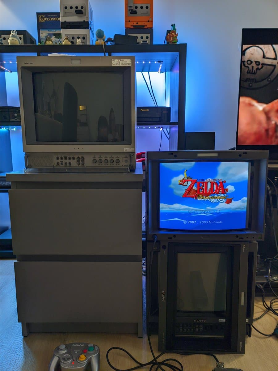 Sony BVM-D14H1E professional CRT monitor displaying Legend of Zelda: The Wind Waker with fascia removed, GameCube controller in foreground.