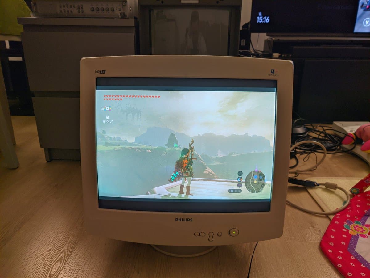 Philips 109S4 CRT displaying The Legend of Zelda: Tears of the Kingdom, showing shadow mask screen with warm tone from nicotine discoloration.