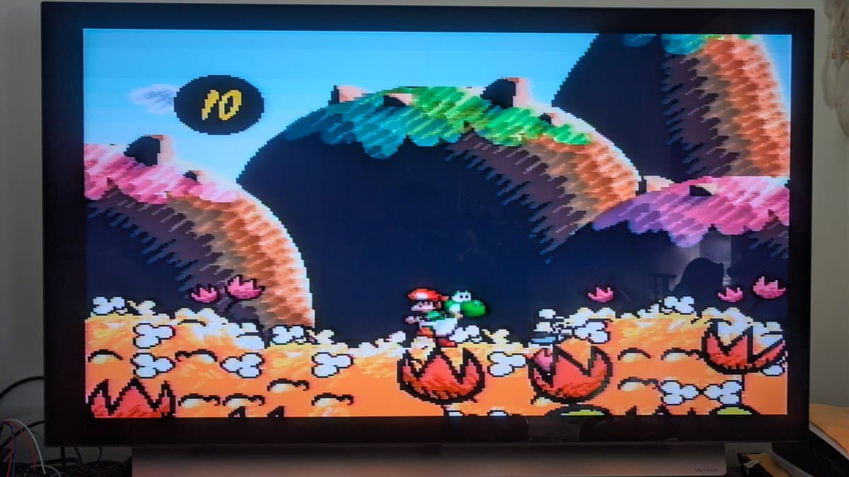 Yoshi's Island running on restored Super Famicom; colorful jungle level with score display, smoke test successful.