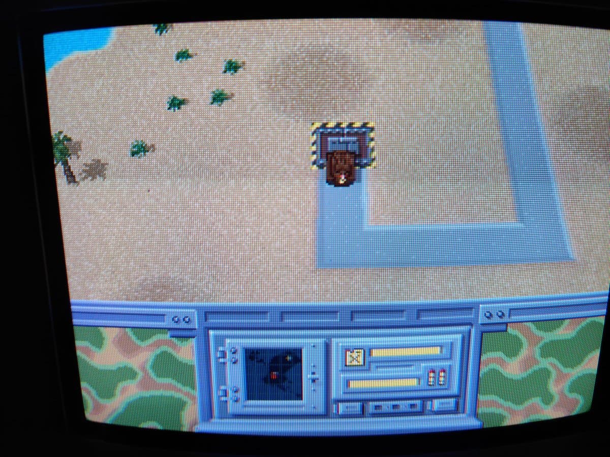 Panasonic FZ-1 3DO running game with sandy beach scene, palm trees, and blue building structure visible on CRT display.