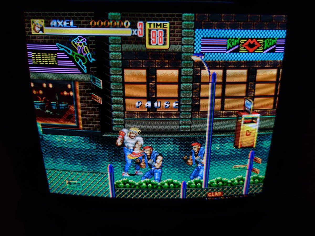 Streets of Rage gameplay on Ikegami HTM-1005RA2 CRT monitor showing vibrant colors, sharp image, and properly functioning display tube after transit damage assessment.