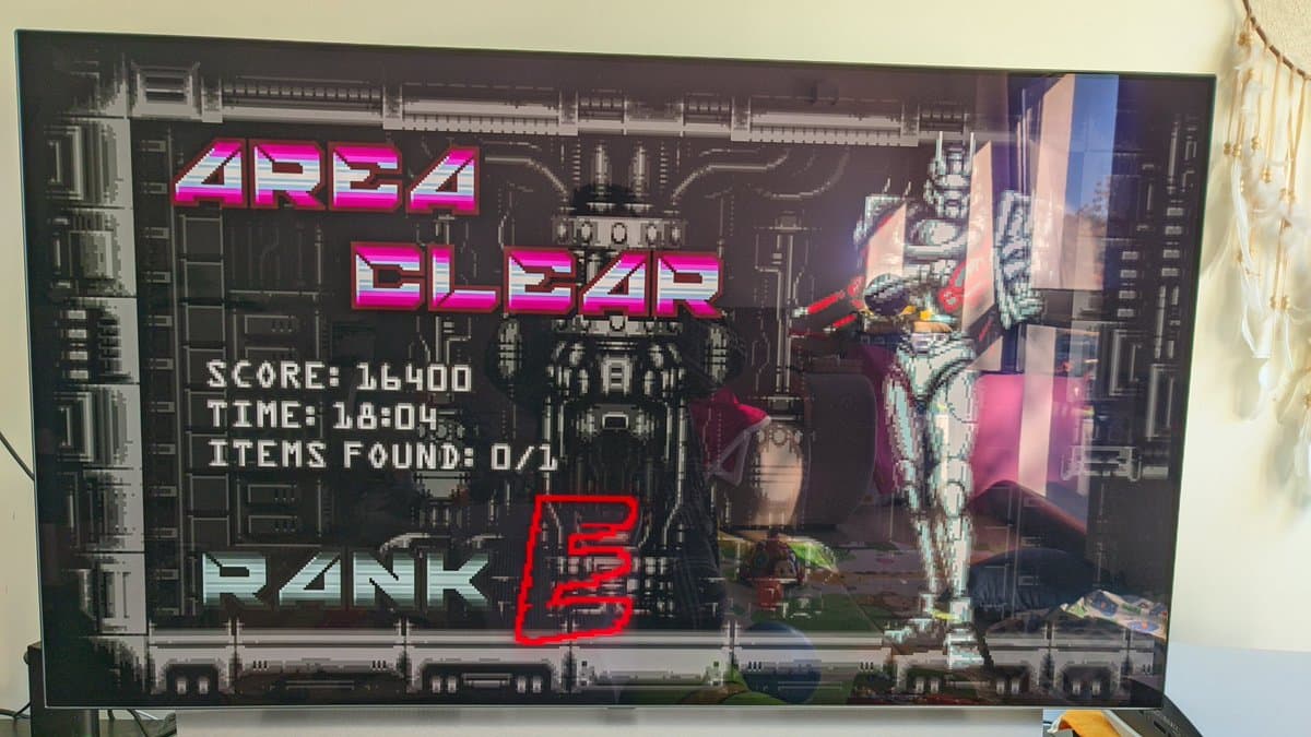 Vengeful Guardian: Moonrider gameplay displayed on restored Sony BVM-D14H1E monitor, showing cyan text overlay with score 16400, time 1:08:04, and rank 5 indicator.