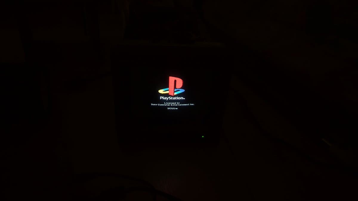 PlayStation 1 startup screen displaying on restored Sony PVM-9045QD monitor after completion of PSU, neck board, and deflection board repairs.