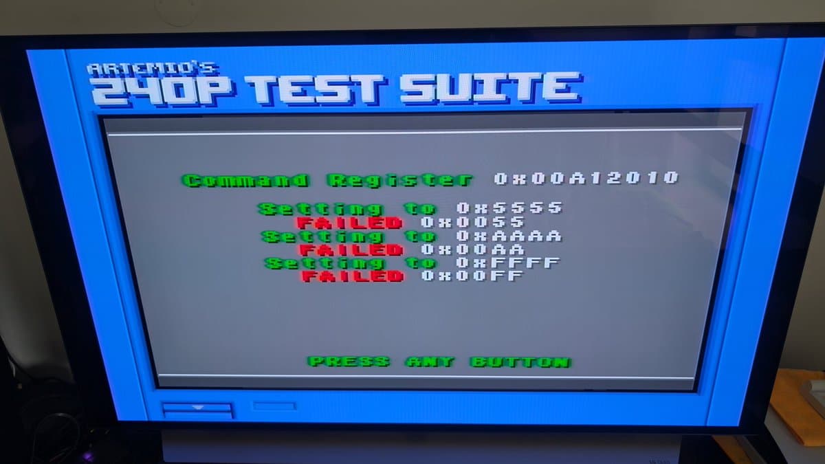 Artemio's 240P Test Suite showing failed command and flag register tests on Sega Wondermega HWM-5010 diagnostic screen.
