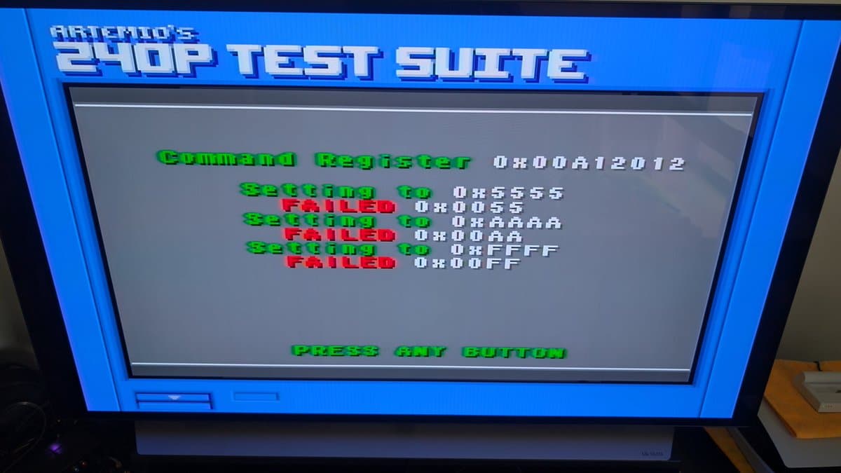 Artemio's 2540P test suite showing failed command and setting registers with hex addresses on Wondermega diagnostic screen.