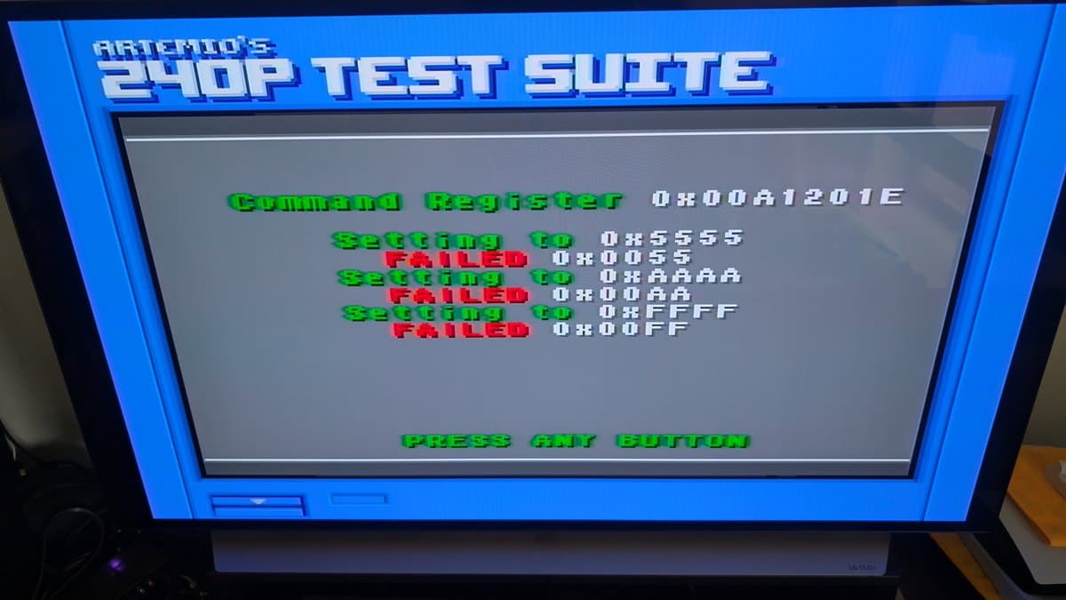 Sega Wondermega 240P test suite showing Command Register and Program RAM failures in red text with hex addresses on blue screen.