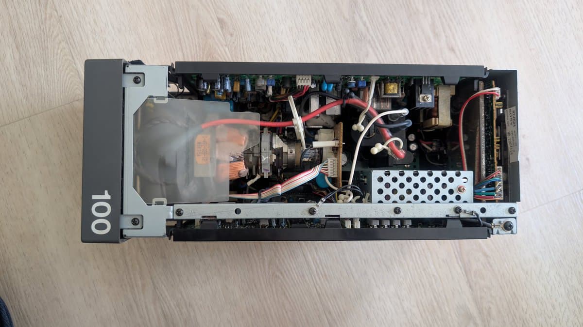 Interior of Sony PVM-6041Q after cleaning; transformer, capacitors, wiring, and power supply components visible.
