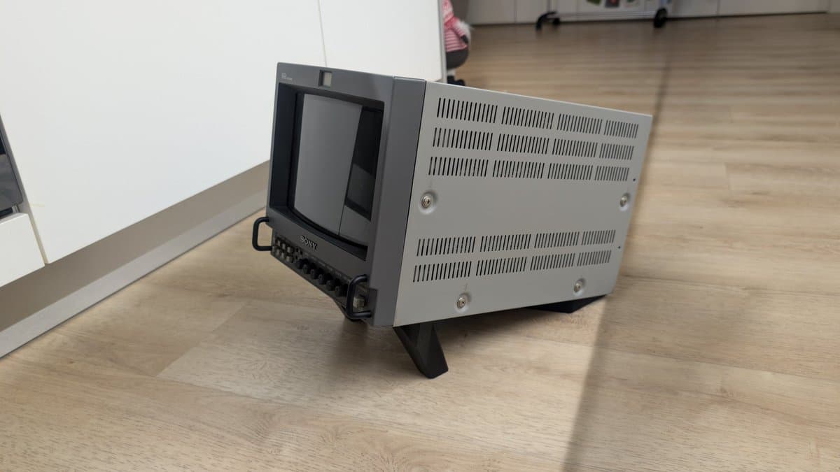 Sony PVM-9045QD on 3D-printed monitor stand, displaying restored unit after PSU, neck board, and deflection board repairs.