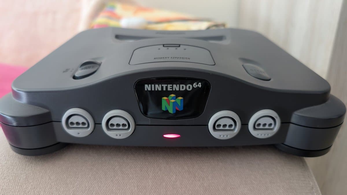 Nintendo 64 console front view showing four controller ports and power indicator light after capacitor replacement repair.