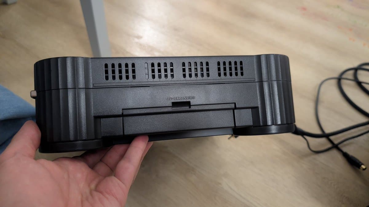 Panasonic FZ-1 AV Expansion Module slot visible on console rear during restoration, showing connector and housing.